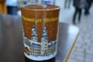 There are Glühwein mugs for each Weihnachtsmarkt (or for each city, rather). You typically pay about 1.50€ extra when you purchase Glühwein, so you can keep the mug if you wish. If not, return the mug and you get your 1.50€ back.